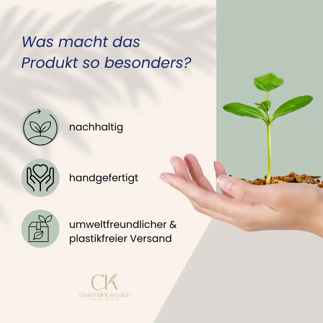 Hand hält junge Pflanze, nachhaltig & handgefertigt